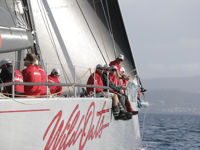 Crew enjoying the view on the River Derwent. Wild Oats XI skippered by Mark Richards sails up the River Derwent on her way to a 9th line honours victory in the 2018 Sydney to Hobart Yacht Race. The yacht crossed the line in 1d 19hrs 7mins 21secs . Picture: RICHARD JUPE
