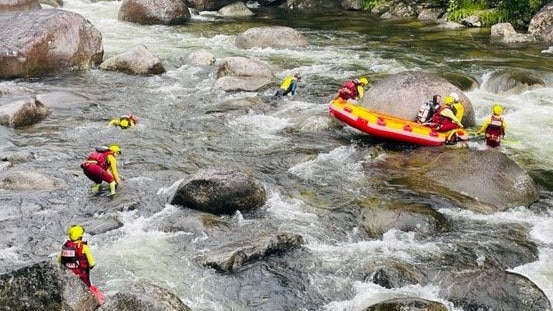 Members of the Cairns team of the Queensland Fire and Emergency Services Swiftwater Unit in January searched for a woman who went missing after being swept away at Mossman Gorge in Far North Queensland. Picture: Supplied