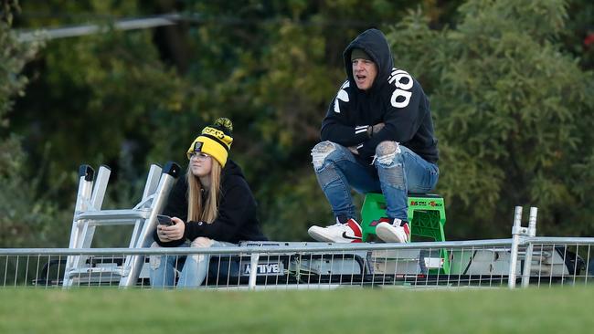 Locked-out fans during the 2020 AFLW match between the St Kilda Saints and the Richmond Tigers. Picture: AFL Photos via Getty Images)