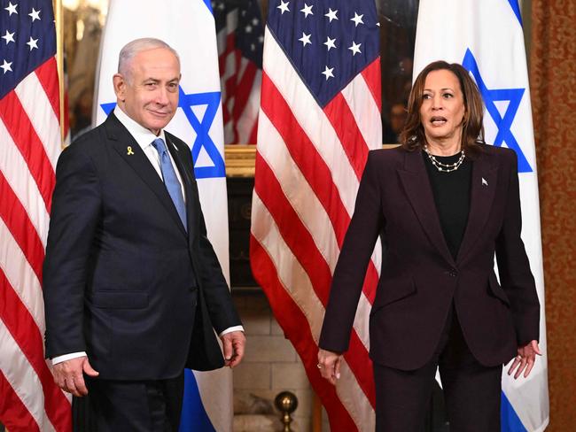 (FILES) US Vice President Kamala Harris and Israeli Prime Minister Benjamin Netanyahu arrive for a meeting in the Vice Presidentâ&#128;&#153;s ceremonial office at the Eisenhower Executive Office Building in Washington, DC, on July 25, 2024. Conflict in the Middle East has weighed heavily on the US presidential campaign over the last year, and now -- as tensions escalate further -- it could sway November's election. Democratic candidate Kamala Harris finds herself treading on eggshells as she upholds President Joe Biden's support for key ally Israel, while running the risk of alienating Muslim and Arab American voters. Meanwhile, Donald Trump has pounced on the conflict to warn of a third world war -- an apocalyptic prognosis that he blames on the incumbent administration. (Photo by ROBERTO SCHMIDT / AFP)