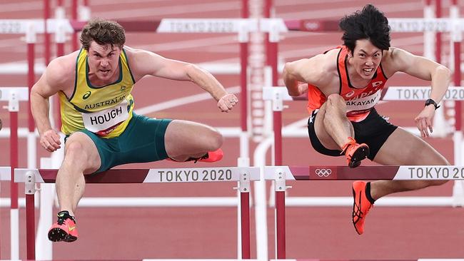 TOKYO, JAPAN - AUGUST 03:  (L-R) Gregor Traber of Team Germany, Nicholas Hough of Team Australia, Shunya Takayama of Team Japan and Jeremie Lararaudeuse of Team Mauritius in round one of the Men's 110m Hurdles heats on day eleven of the Tokyo 2020 Olympic Games at Olympic Stadium on August 03, 2021 in Tokyo, Japan. (Photo by Christian Petersen/Getty Images)