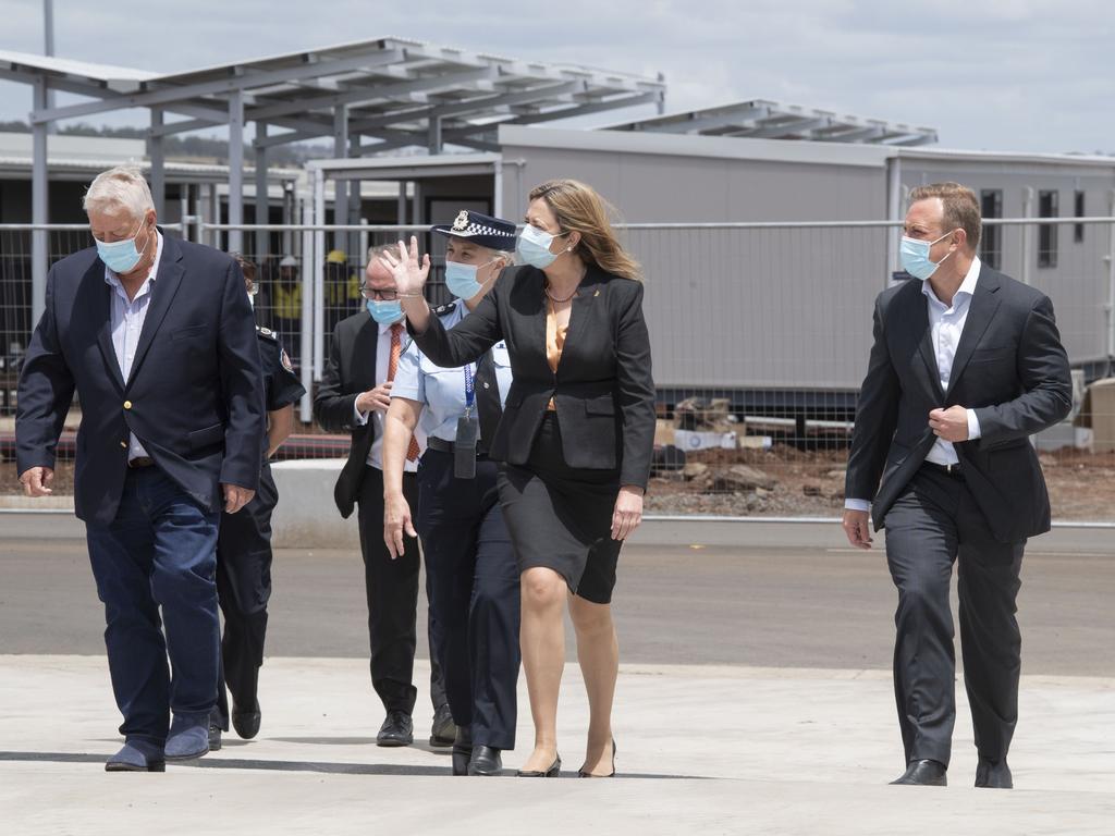 John Wagner with Annastacia Palaszczuk and Steven Miles. Queensland Premier Annastacia Palaszczuk and Deputy Premier Steven Miles visit the Wellcamp quarantine hub. Wednesday, February 16, 2022. Picture: Nev Madsen.