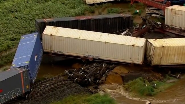 Freight train derailment in Victoria leaves more than a dozen shipping ...