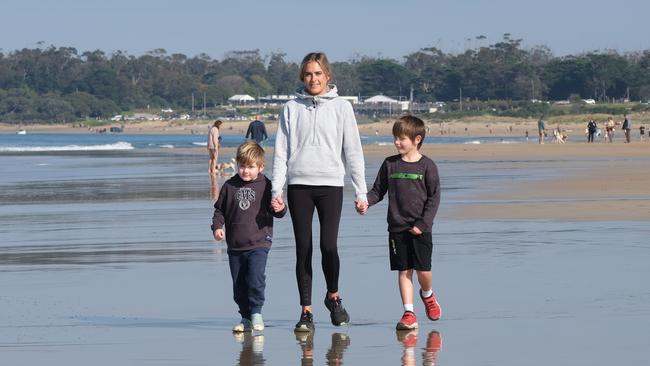 Ollie, 5, at the beach with mum Millie and brother Tom, 7, Picture: Mark Wilson