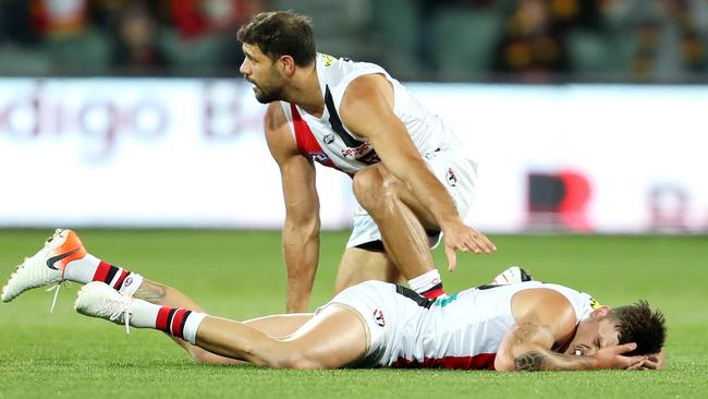 Paddy Ryder checks on Josh Battle after a heavy clash. Picture: Sarah Reed