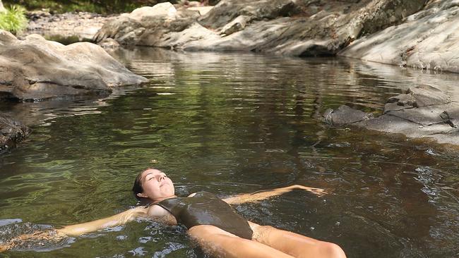 HOLD COURIER MAIL SATURDAY 16TH FEB Harrison Craig-Ward and Georgia Dimmock enjoying the Currumbin Rock Pools om the Gold Coast. Pic Peter Wallis