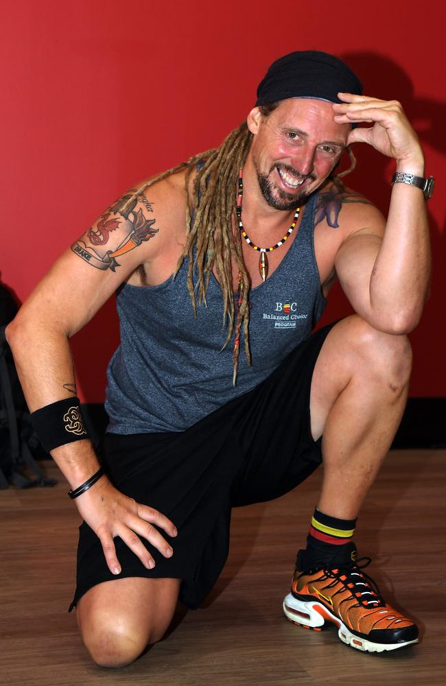 Adam Drake is all smiles after doing 64 push-ups in under a minute and breaking the world record. Picture: (A)manda Parkinson