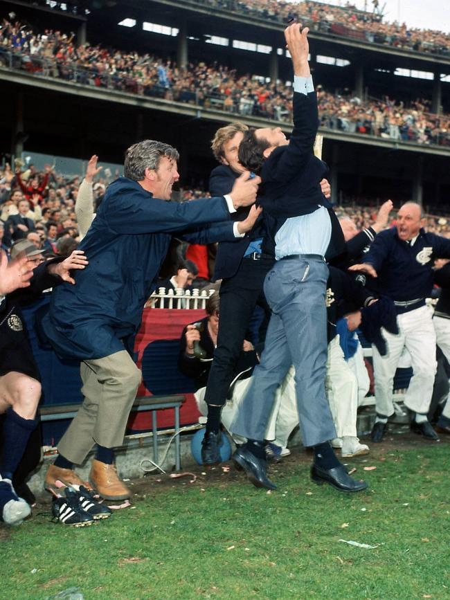 Barassi jumps for joy as the final siren sounds in the 1970 grand final.