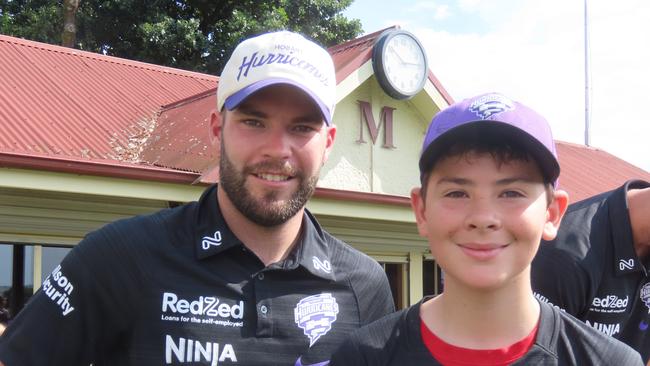 Hurricanes fan Tommy Medcraft, 11, with player Caleb Jewell at Tuesday's fan day in Launceston. Picture: Jon Tuxworth