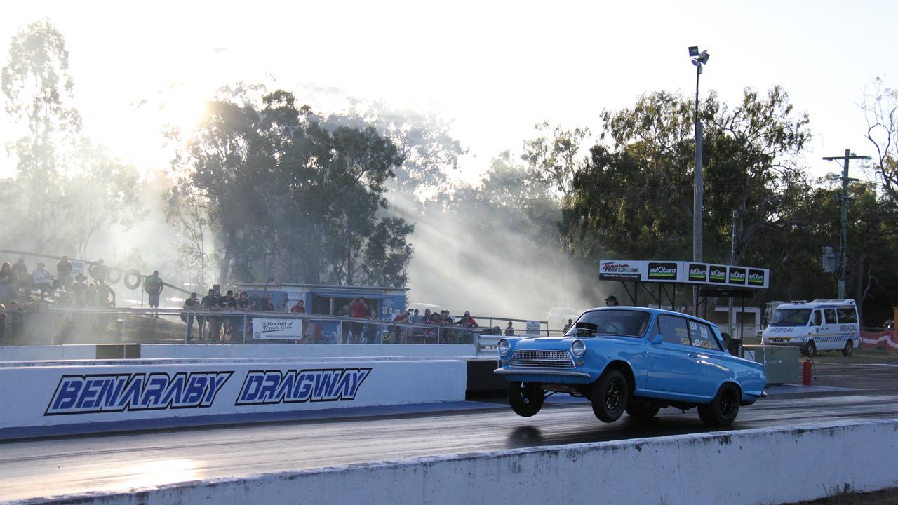 Shane Stefanuik launches the front wheels off the ground during qualifying in his Cortina. Picture: Rodney Stevens
