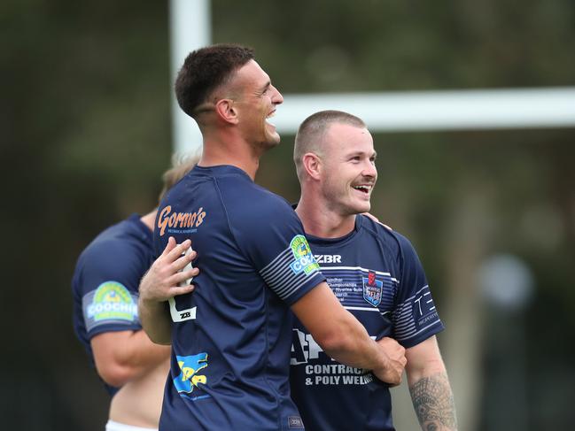 Newcastle’s Joe Woodbury and Lewis Hamilton celebrate. Picture: Sue Graham