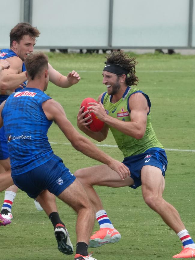 Marcus Bontempelli evades a tackle during the Dogs' match simulation in Maroochydore