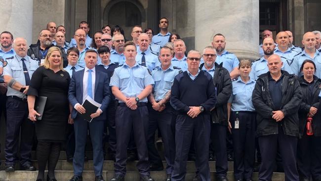 Labor MPs Lee Odenwalder (correctional services spokesman) and Katrine Hildyard with prison guards from the Adelaide Remand Centre at Parliament House during Opposition Leader Peter Malinauskas's Budget reply speech. Picture: Lee Odenwalder/Twitter