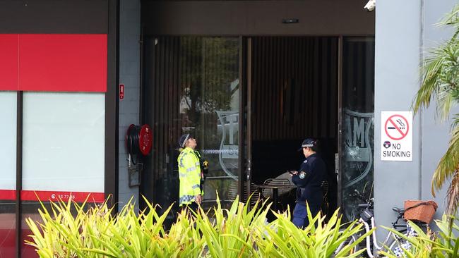 Police at the shooting scene in May.