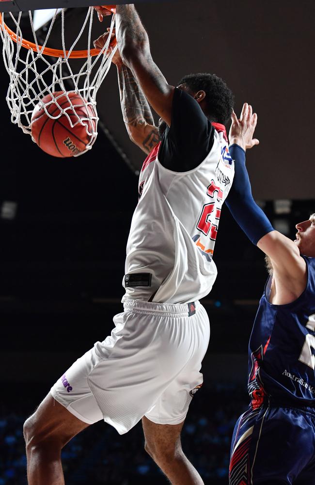 Billy Preston dunks over Anthony Drmic on Friday night. Picture: Mark Brake (Getty).