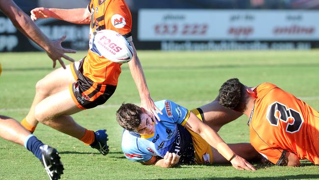 Angus Hinchey looses the ball Unnder 18 Mal Meninga Cup rugby league match. Picture, John Gass