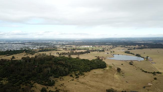 The site of the Tidapa proposal, which is set to have plans for 800 new homes thrown out by Camden Council. New homes at Oran Park can be seen in the distance. Picture: Jonathan Ng