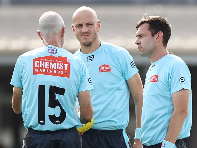 Umpires will continue to place Brownlow votes without seeing statistics. Pic: Michael Klein