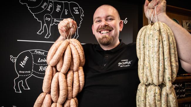 There is plenty to smile about when you have been crowned the best sausages in town. Picture: Julian Andrews