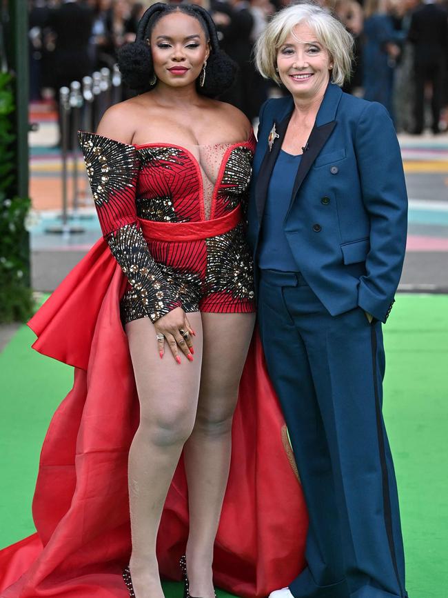 Nigerian singer Yemi Alade (L) and British actress Emma Thompson (R) arrive on the green carpet. Picture: AFP.