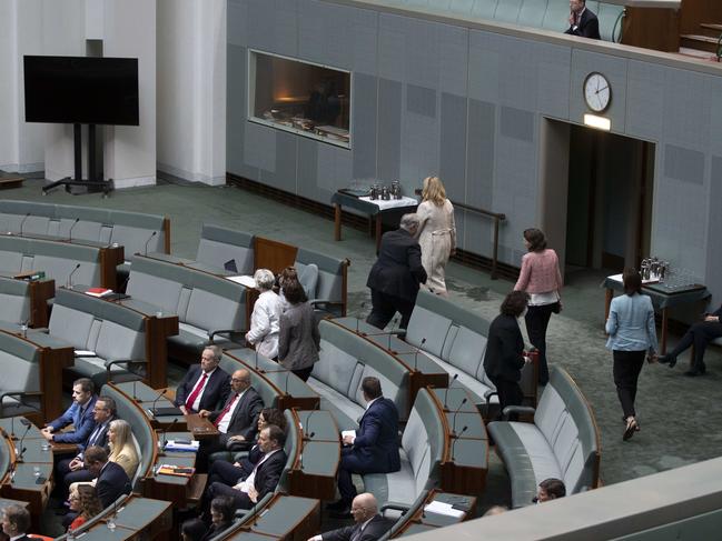 After listening to Mr Morrison’s speech, as a show of support the Coalition MPs staged a mass walkout while other MPs spoke on the motion.