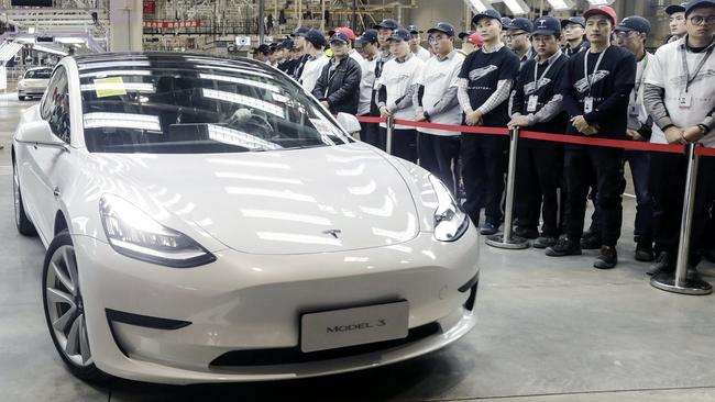 A Tesla Model 3 moves off an assembly line in Shanghai. Picture: Bloomberg