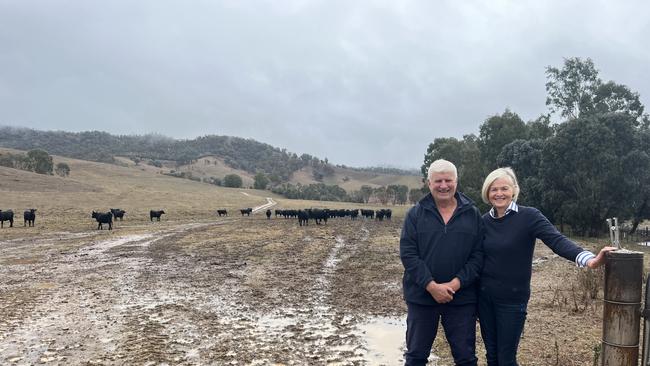 Peter and Mary Hoodless from Jingellic, NSW. Their farm is not in a drought-declared area but the family's enterprise is spending about 45 hours a week feeding cattle. And this will not stop, despite receiving 45mm of rain, the biggest fall for months after two failed autumns and a short spring.