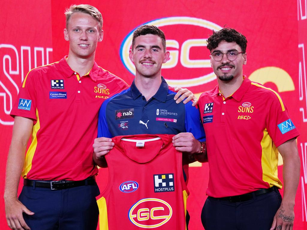 Lukosius and Izak Rankine with their new Suns teammate Sam Flanders at the 2018 draft. Picture: Image/Michael Dodge