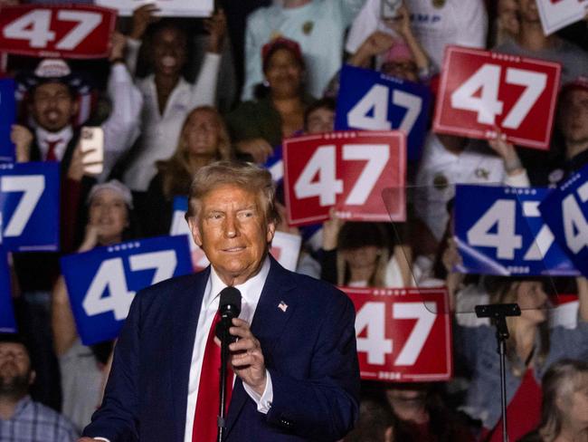 Former US President and Republican presidential candidate Donald Trump speaks at a campaign rally at McCamish Pavilion on the campus of the Georgia Institute of Technology in Atlanta, Georgia, on October 28, 2024. (Photo by CHRISTIAN MONTERROSA / AFP)