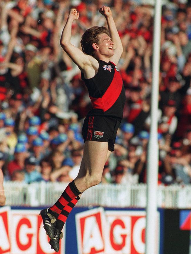 James Hird celebrates kicking a goal in the 1993 Grand Final.