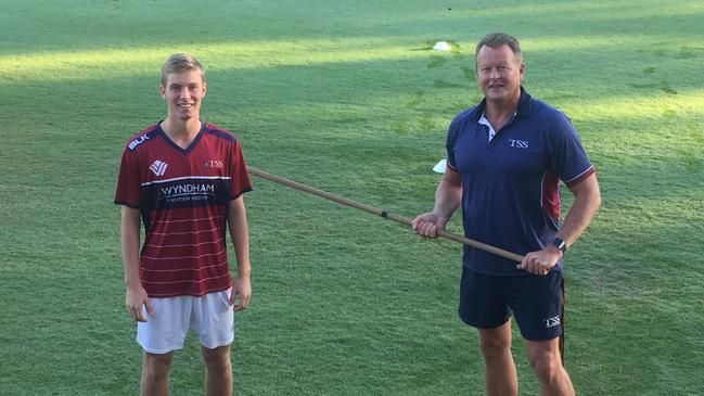 Damian Mednis (right) with student Ewan MacLeod, captain of firsts soccer team, taking the TSS students through a training routine via video. Picture: Supplied.