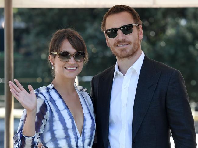 Michael Fassbender and Alicia Vikander pose as they arrive at the Excelsior Hotel to promote the movie “The Light Between Oceans” presented in competition at the 73rd Venice Film Festival on August 31, 2016. Picture: AFP