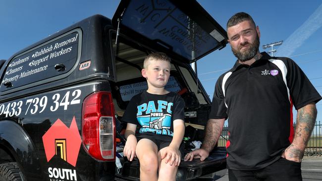 James Evers-Watson and son, Toby, 8, were resilient after the theft of the trailer, but its return has given them a new opportunity. Picture: Dean Martin