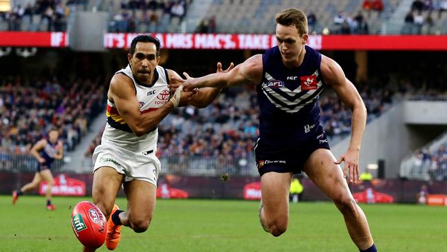 Eddie Betts grapples with Fremantle’s Ryan Nyhuis on Sunday. Picture: Will Russell/AFL Media/Getty Images