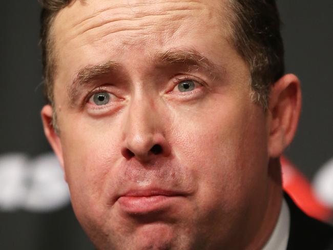 Alan Joyce, chief executive officer of Qantas Airways Ltd., listens during a news conference in Sydney, Australia, on Thursday, Aug. 28, 2014. Qantas, Australia's biggest carrier, forecast a return to profit after posting a record loss as a domestic market share fight with Virgin Australia Holdings Ltd. eases. Photographer: Brendon Thorne/Bloomberg via Getty Images