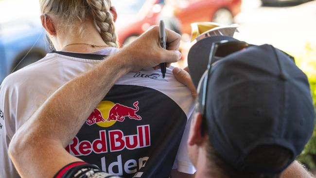 Supercar champion Will Brown signing autographs at Cars Galore in Toowoomba, Sunday, November 24, 2024. Picture: Kevin Farmer