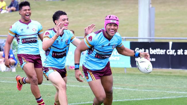 Jubo after No.3 Joseph Tupuse scores a try (pink head gear), Keebra park (Light) VÃs Mabel Park (Dark), at the Langer Trophy rugby league semi-finals, Nundah, Wednesday 7th August - Photo Steve Pohlner