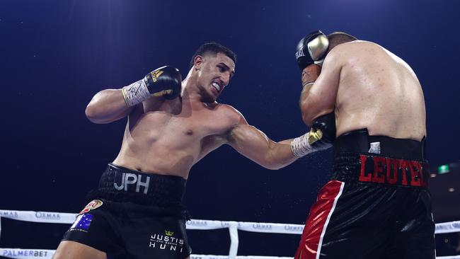 Justis Huni punches Kiki Toa Leutele during the bout at Nissan Arena on November 04. Picture: Chris Hyde/Getty Images