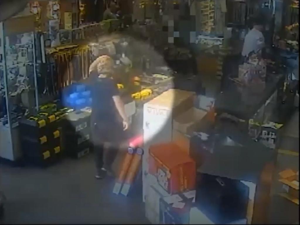 CCTV footage showing the then-teen buying bayonets at a Bankstown gun store.