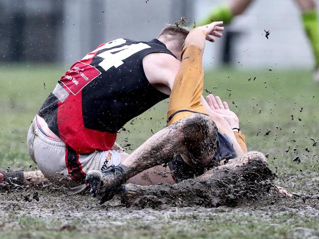 Pascoe Vale’s Jack Whaley and Strathmore’s Alex Grima lock horns. Picture: Mark Dadswell