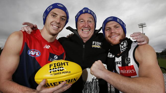 Neale Daniher with Jake Lever and Taylor Adams. Picture: David Caird