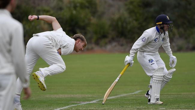 Tom Scriven rolls the arm over for Croydon. Picture: Andrew Batsch