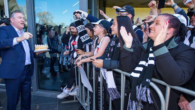 Collingwood president Eddie McGuire rallies the fans at training on Thursday. Picture: Mark Stewart