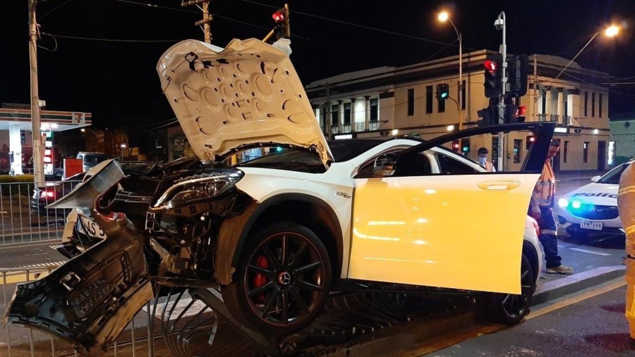 The Braybrook man’s Mercedes AMG was written off after driving along Nicholson Street before smashing into a barrier on a tram platform near Elgin Street about 12.45am.