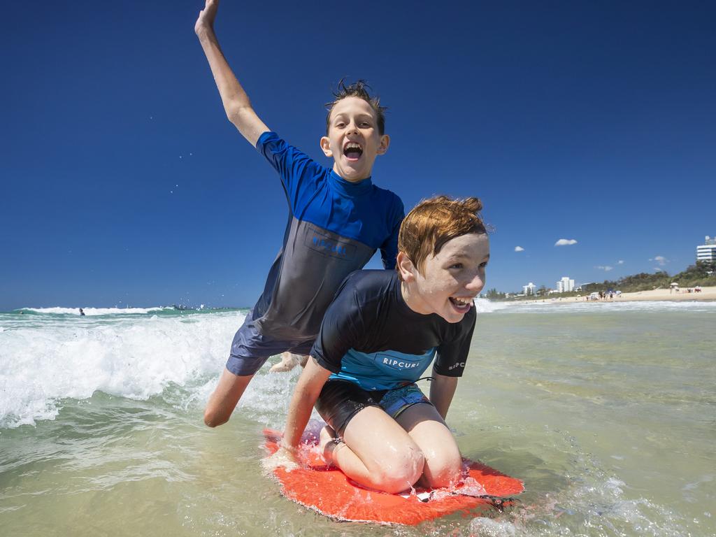 Best mates Patrick Fraser 13, and Carter Hamley 14, make the most of the warm weather. Picture: Lachie Millard