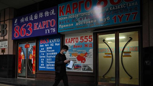 A store advertising cargo shipping to Russia and other countries along a street in Beijing. - Beijing is Moscow's largest trading partner. Picture: AFP