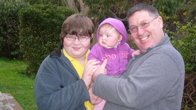 Bhoe Gertners with his dad Greg and baby Jayda. Picture: Supplied by family