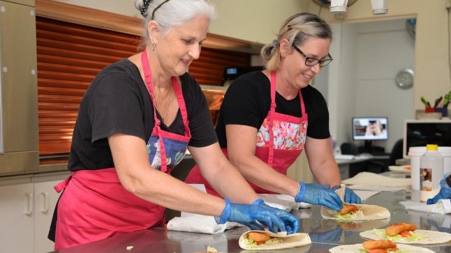 Volunteers run hundreds of tuckshops across the state. Picture: QAST