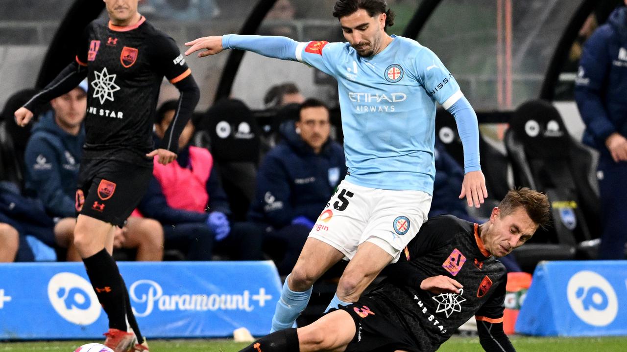 Joel King charges in to a tackle on Callum Talbot.