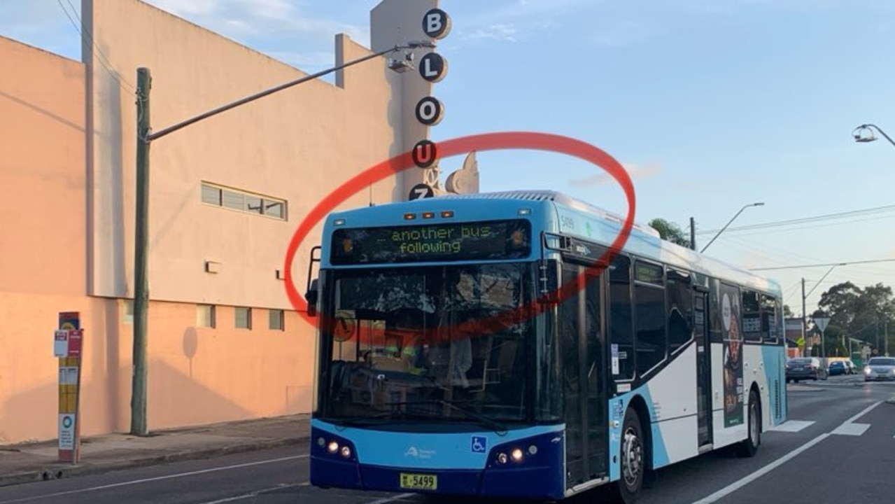 Another bus displays a sign declaring “another bus following” at Blaxcell St, Granville.